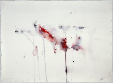 Abstract artwork featuring red and gray splashes and drips on a white background.